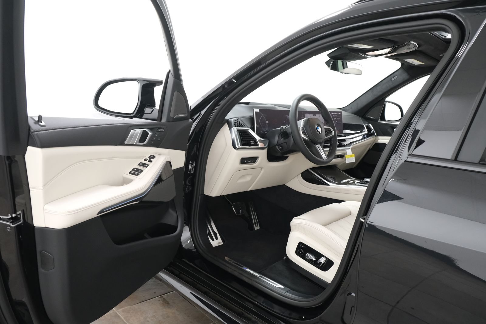New 2027 Black Sapphire Metallic BMW M60i image 24