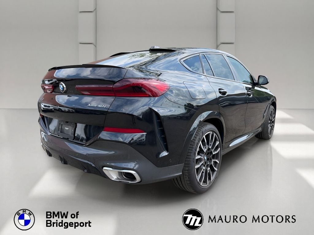 Certified Used 2024 Black BMW xDrive40i image 3