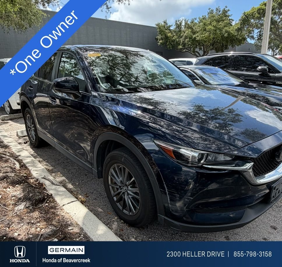 Used 2019 Deep Crystal Blue Mica Mazda Touring image 1