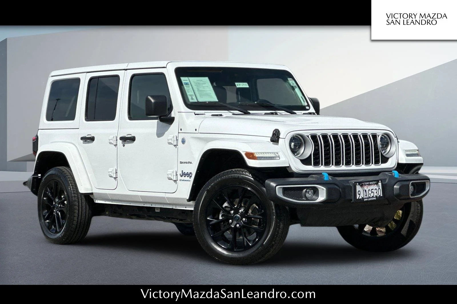 Used 2024 Bright White Clearcoat Jeep Sahara 4xe image 1