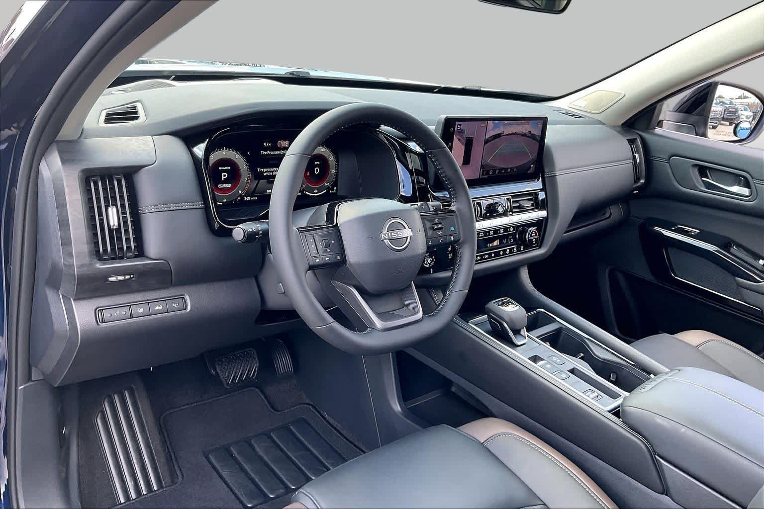 Used 2026 Deep Ocean Blue Pearl Nissan Platinum image 18