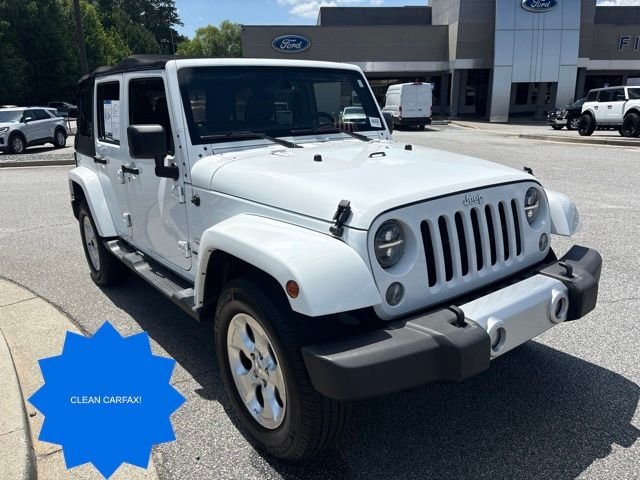 Used 2014 Jeep Wrangler Unlimited Sahara with VIN 1C4BJWEG8EL210950 for sale in Snellville, GA