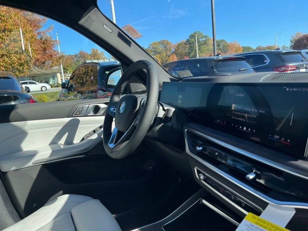 Used 2026 White BMW xDrive50e image 35