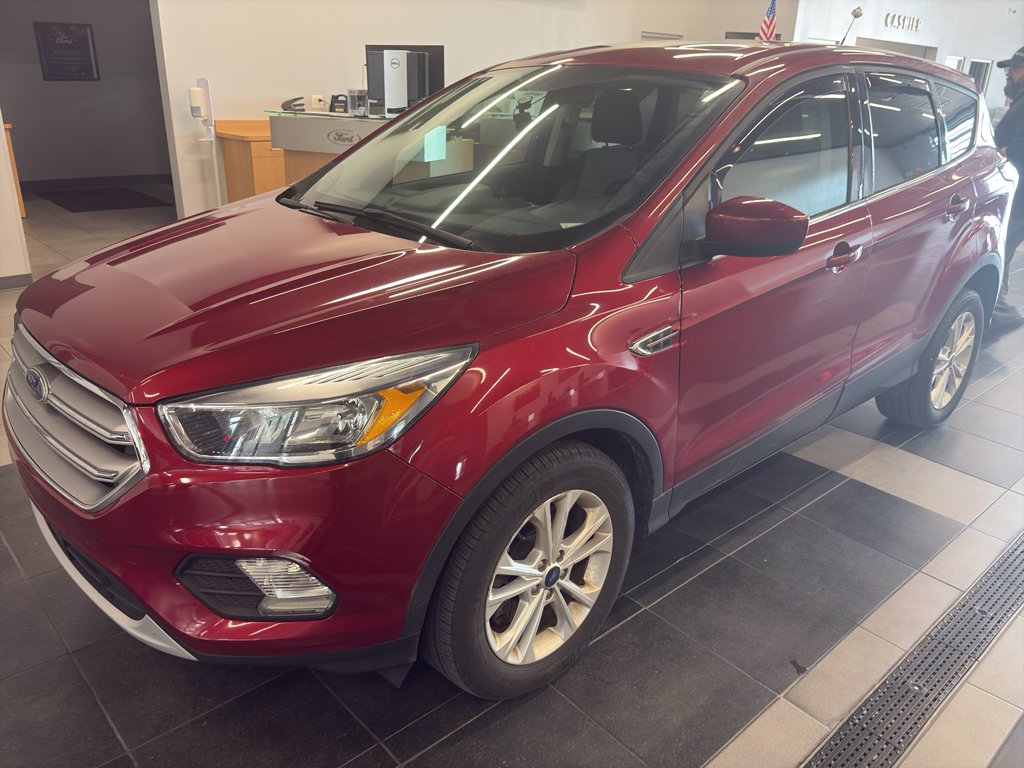Used 2017 Ruby Red Metallic Tinted Clearcoat Ford SE image 2