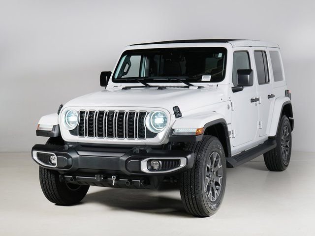 Used 2024 Bright White Clearcoat Jeep Sahara image 1