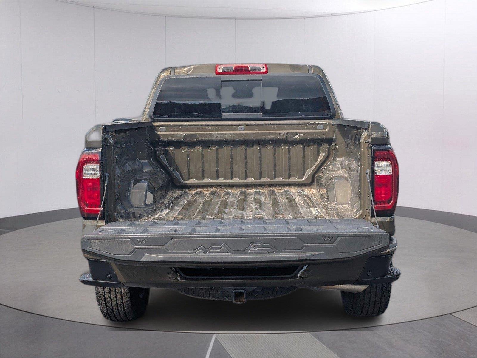 Used 2024 Deep Bronze Metallic GMC AT4 image 6