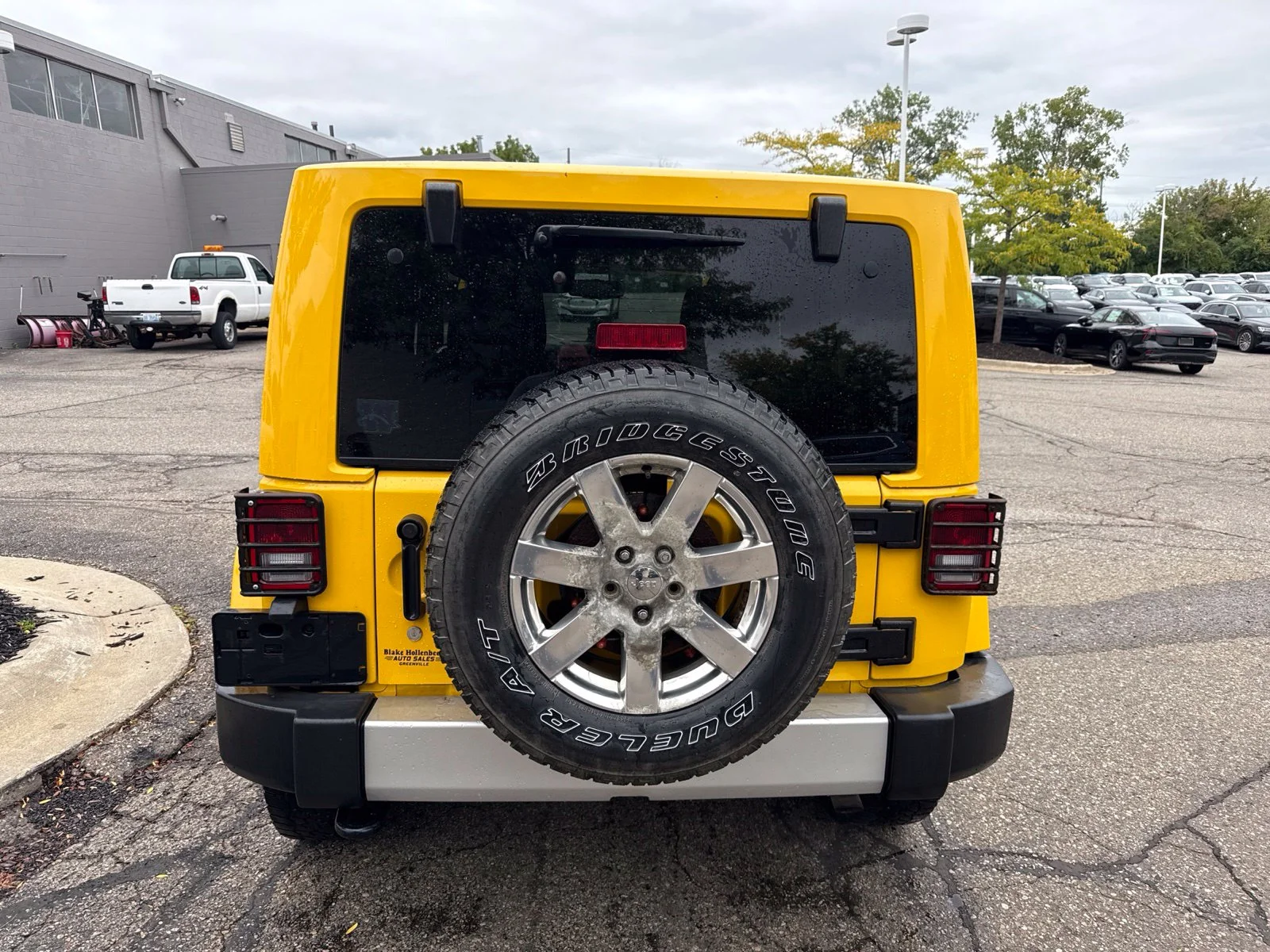 Used 2015 Baja Yellow Clearcoat Jeep Sahara image 6