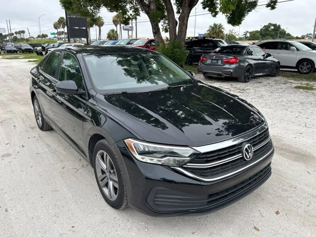 Used 2024 Deep Black Pearl Volkswagen SE image 1