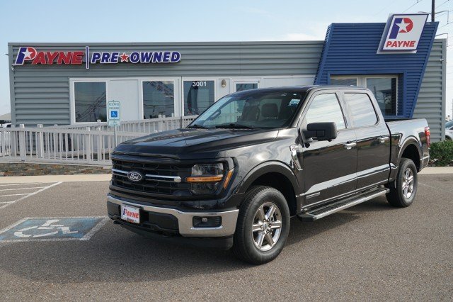 Used 2024 Agate Black Metallic Ford XLT image 1