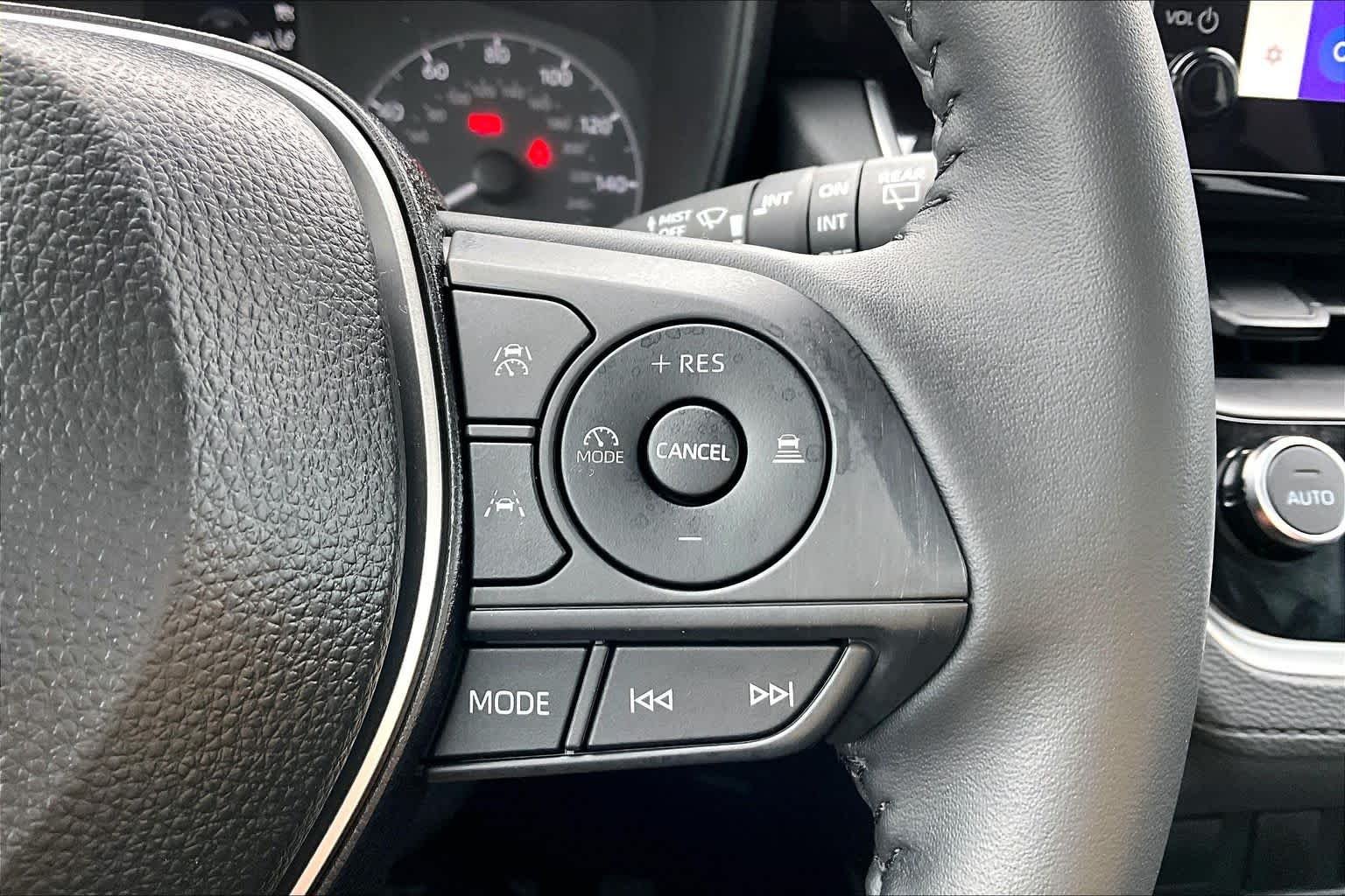 Used 2025 Blue Crush Metallic Toyota LE image 24