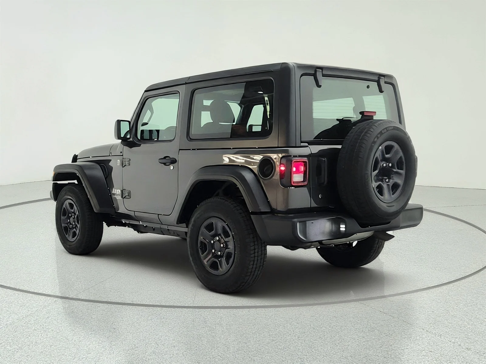 Used 2018 Granite Crystal Metallic Clearcoat Jeep Sport image 7