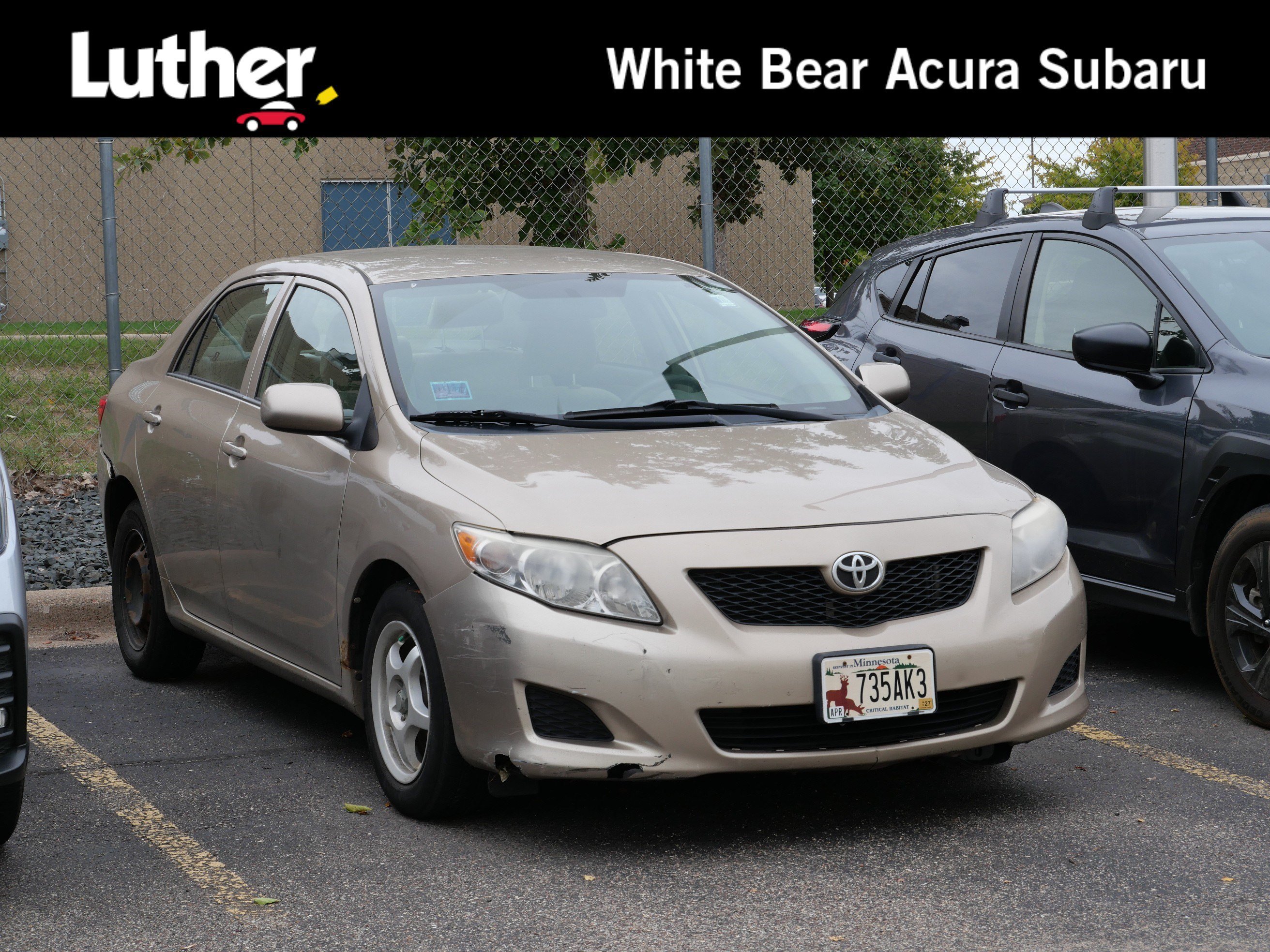 Used 2009 Desert Sand Mica Toyota LE image 1