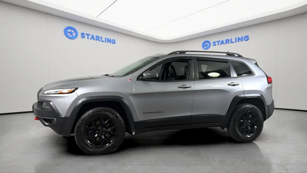 Used 2017 Jeep Cherokee Trailhawk with VIN 1C4PJMBS1HW633665 for sale in Titusville, FL