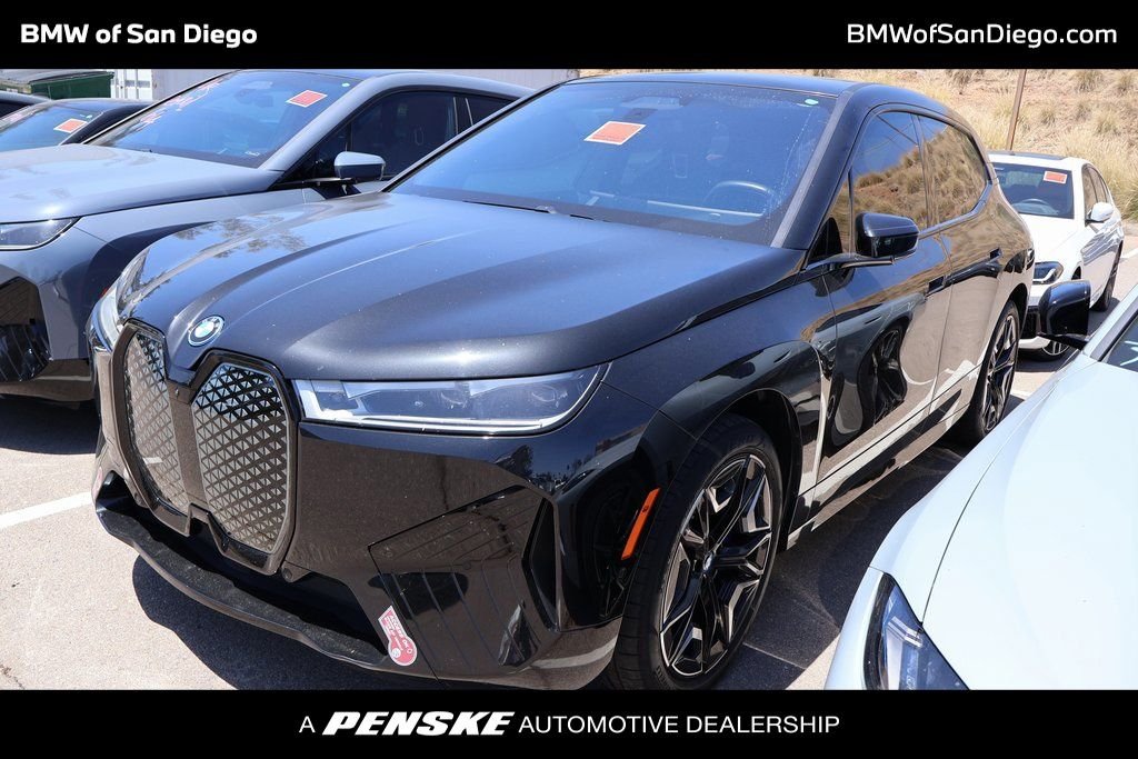 Certified Used 2024 Black Sapphire Metallic BMW xDrive50 image 1