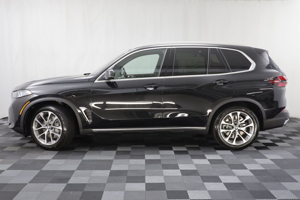 New 2026 Black Sapphire Metallic BMW xDrive50e image 5