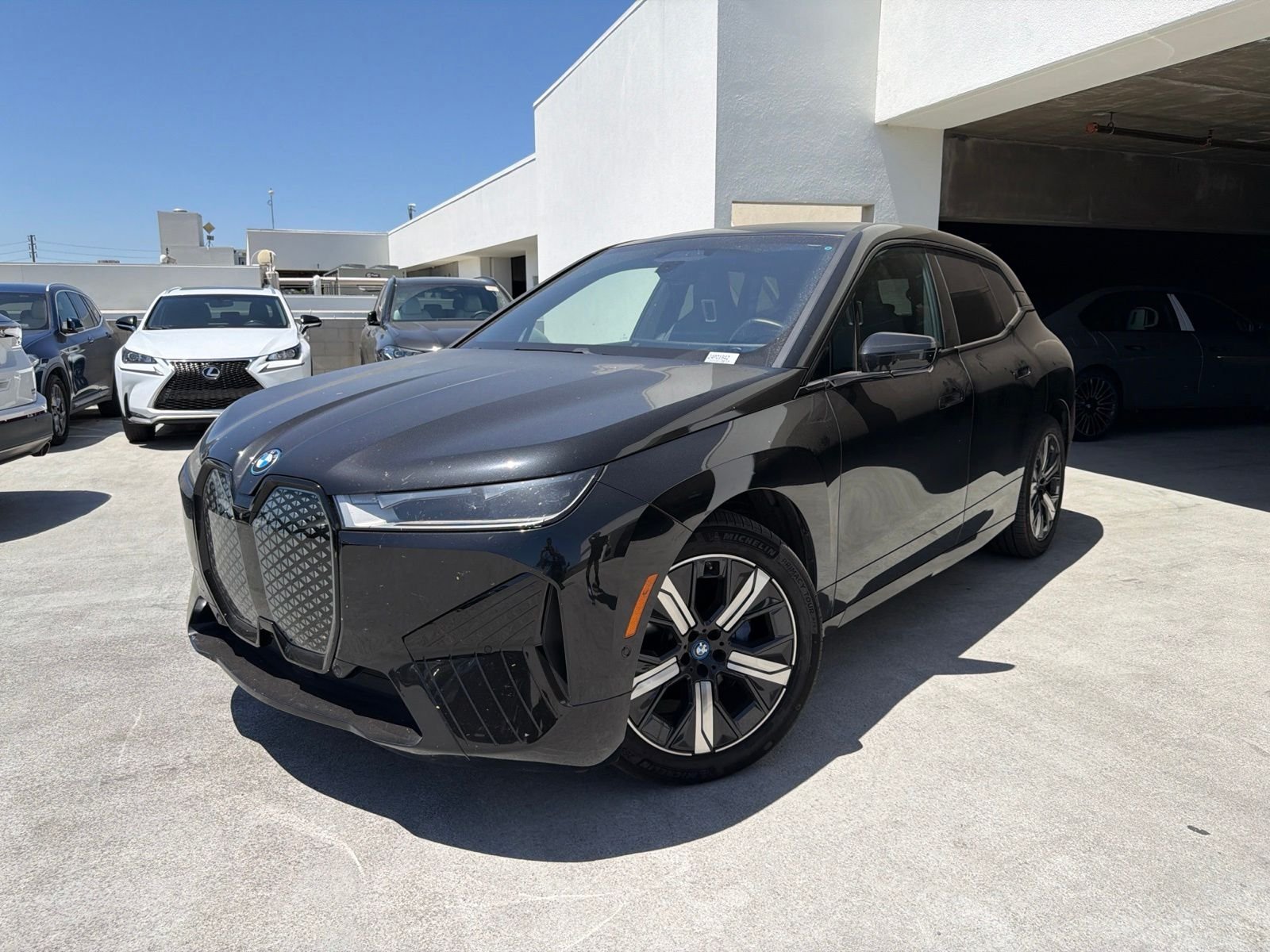 Used 2024 Black Sapphire Metallic BMW xDrive50 image 3