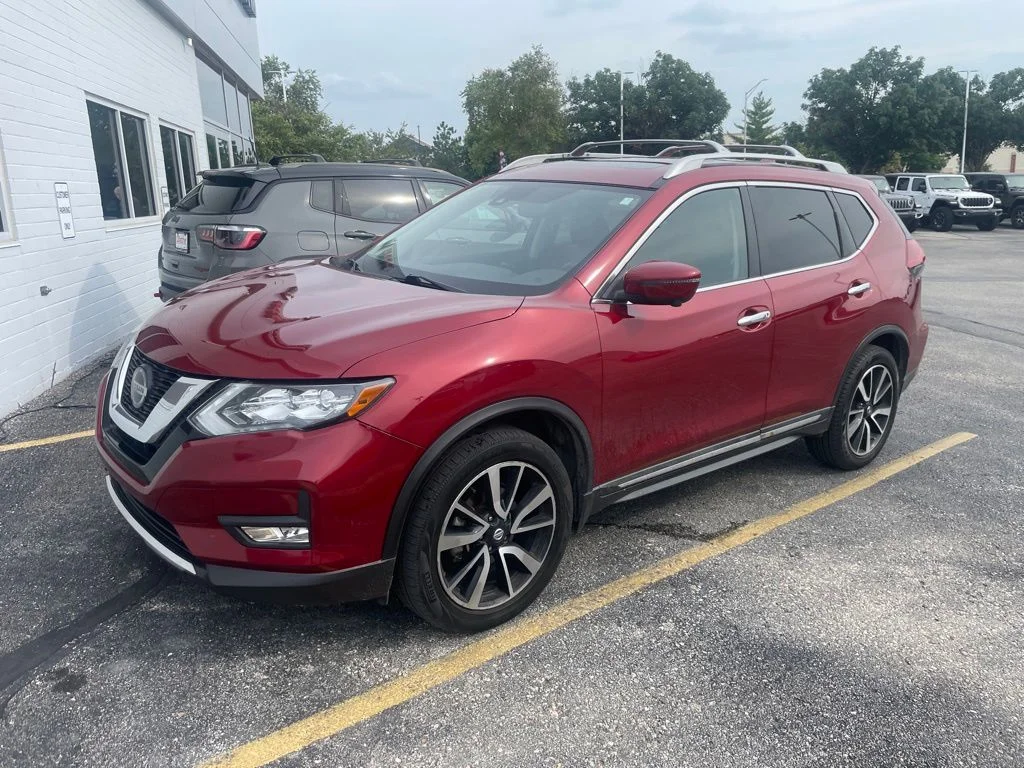 Used 2019 Red Nissan SL image 1