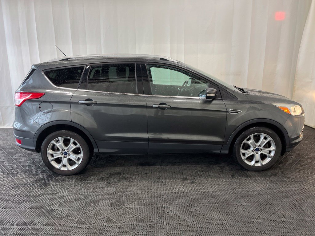 Used 2016 Ford Escape Titanium with VIN 1FMCU9J97GUC04229 for sale in Grand Island, NY