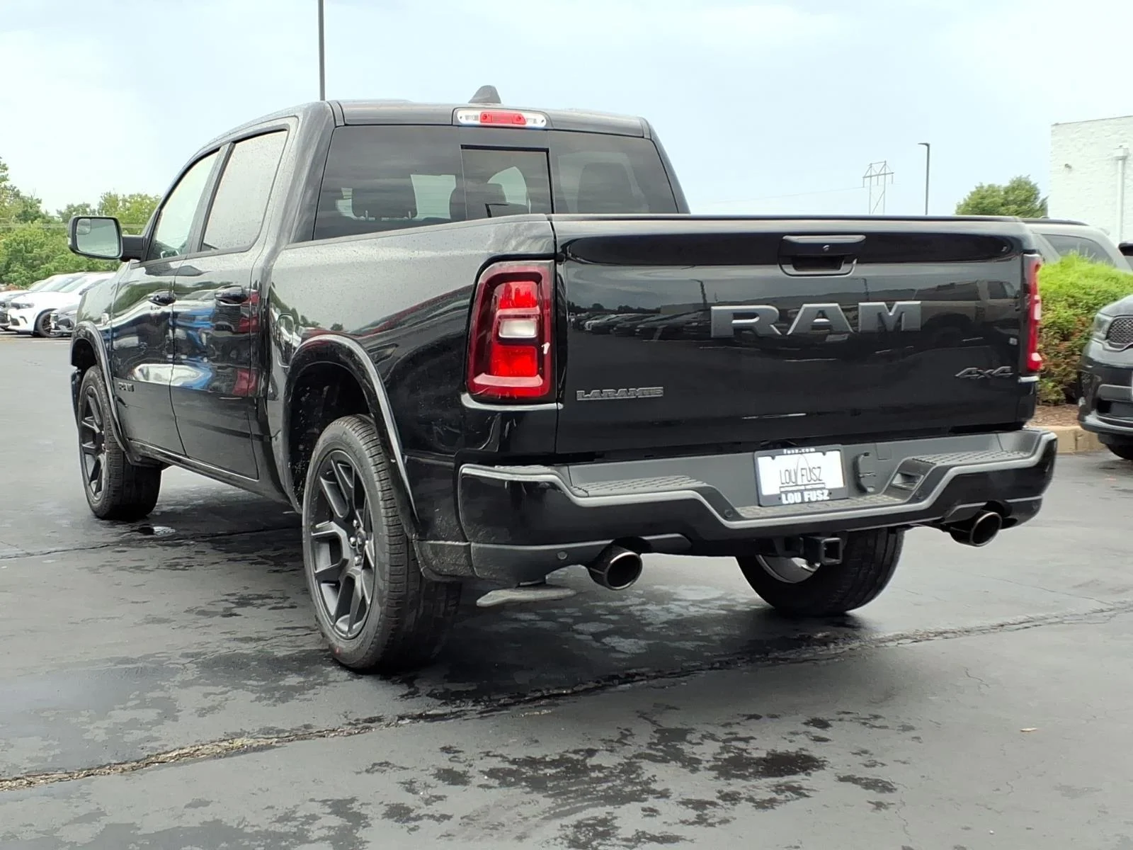 New 2026 Diamond Black Crystal Pearl-Coat Exterior Paint RAM Laramie image 4