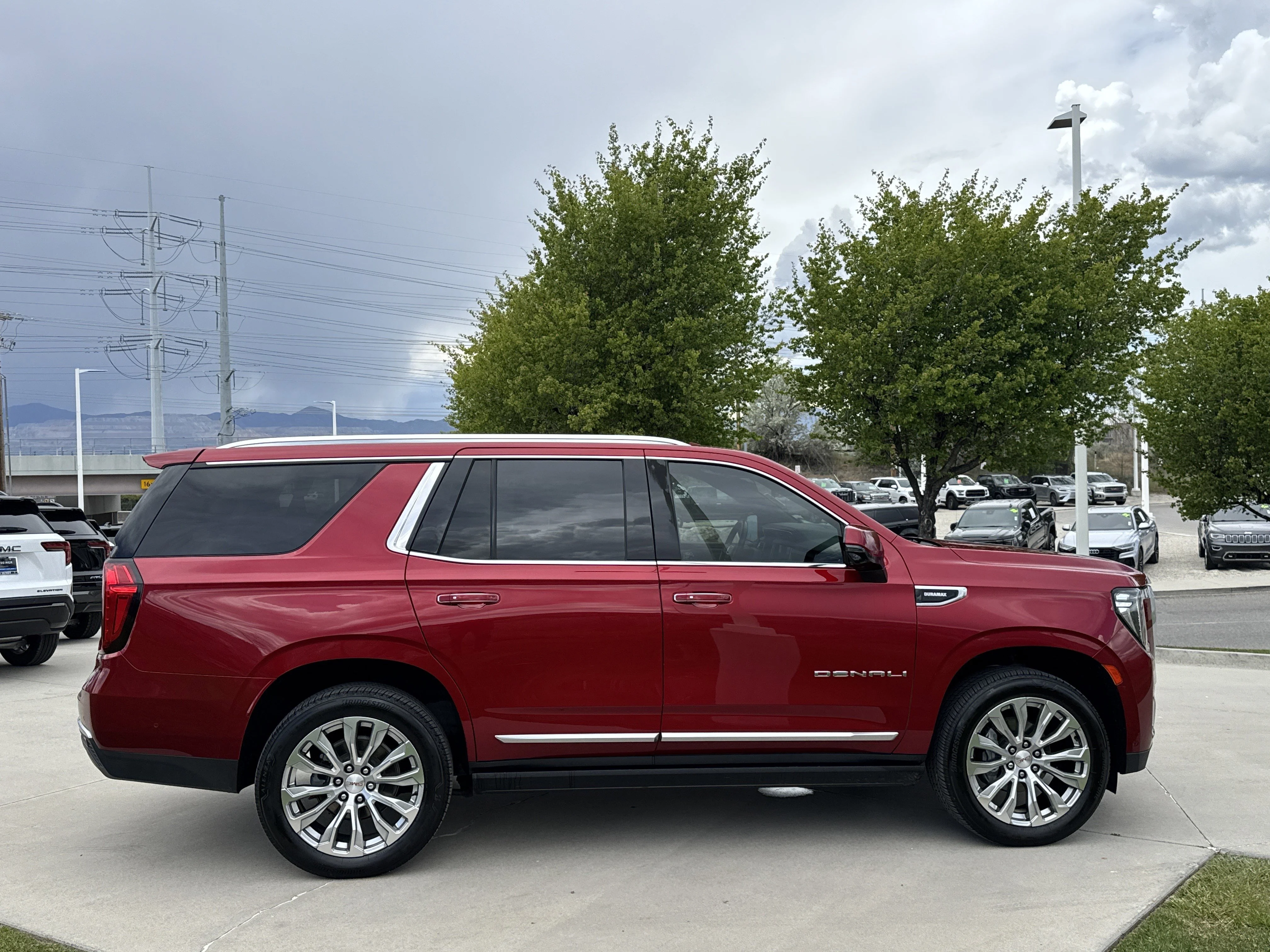 Used 2024 Volcanic Red Tintcoat GMC Denali image 7