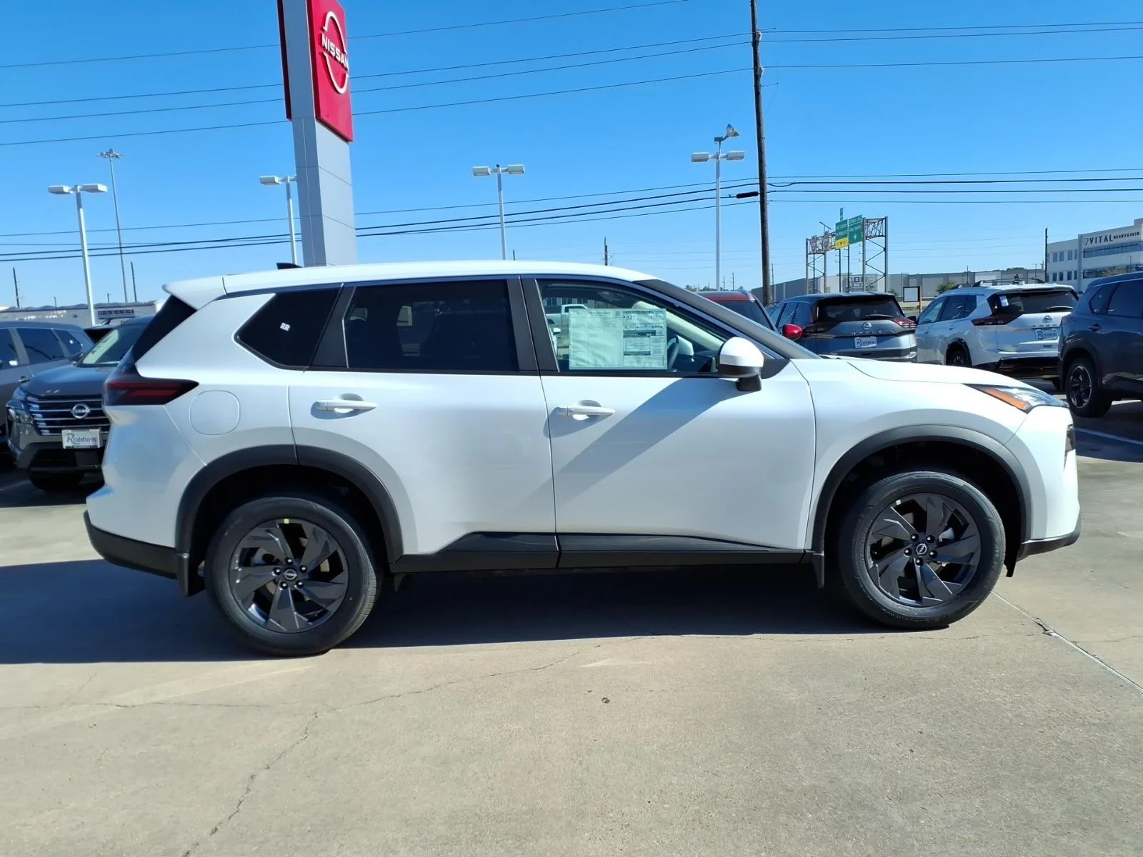 2026 Nissan Rogue SV White at Robbins Nissan