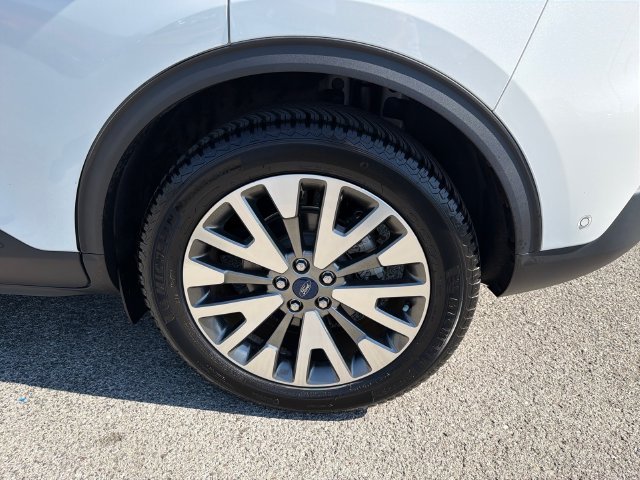 Used 2020 White Metallic Ford Titanium image 6