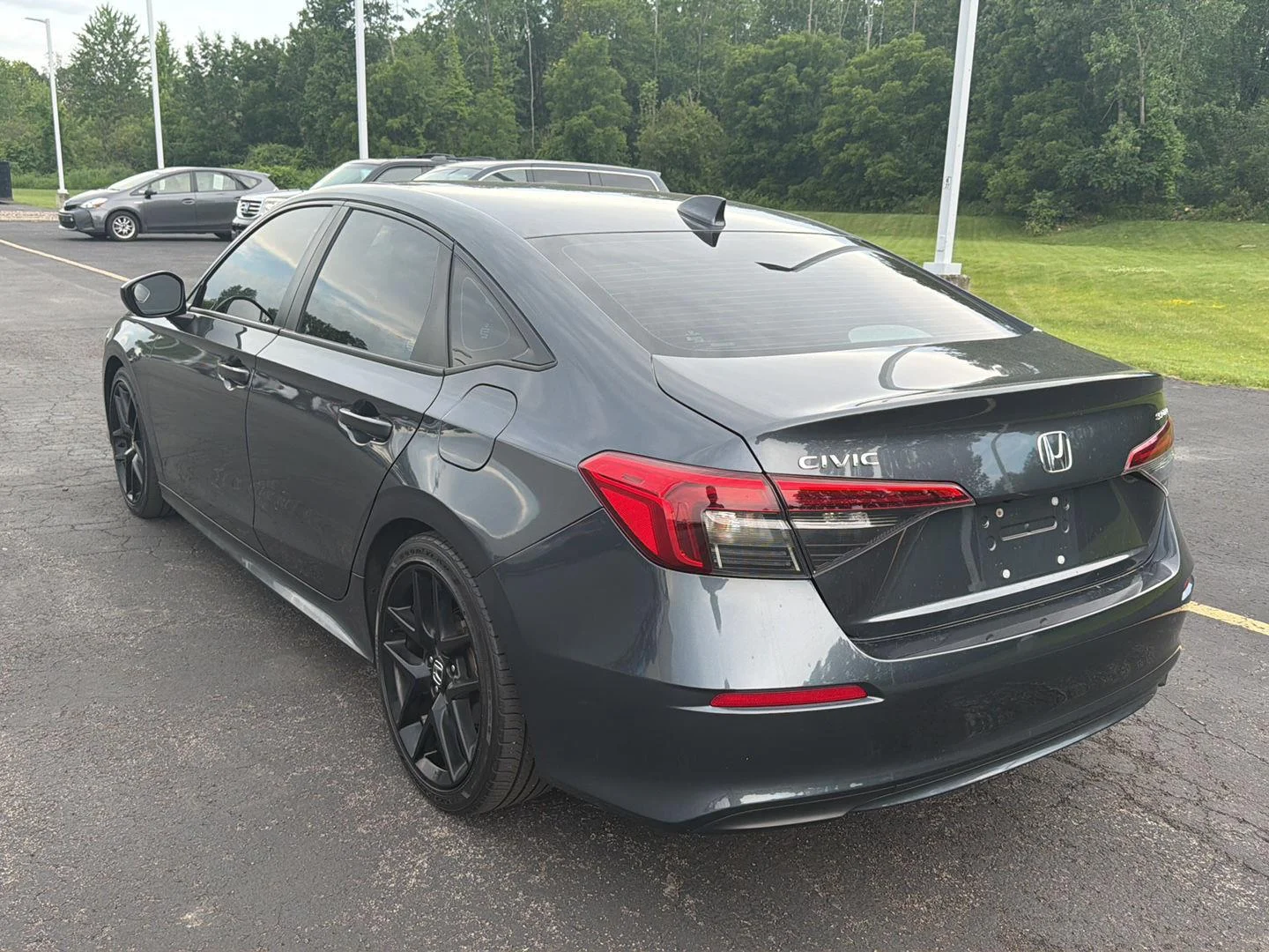 Used 2024 Meteorite Gray Metallic Honda Sport image 7
