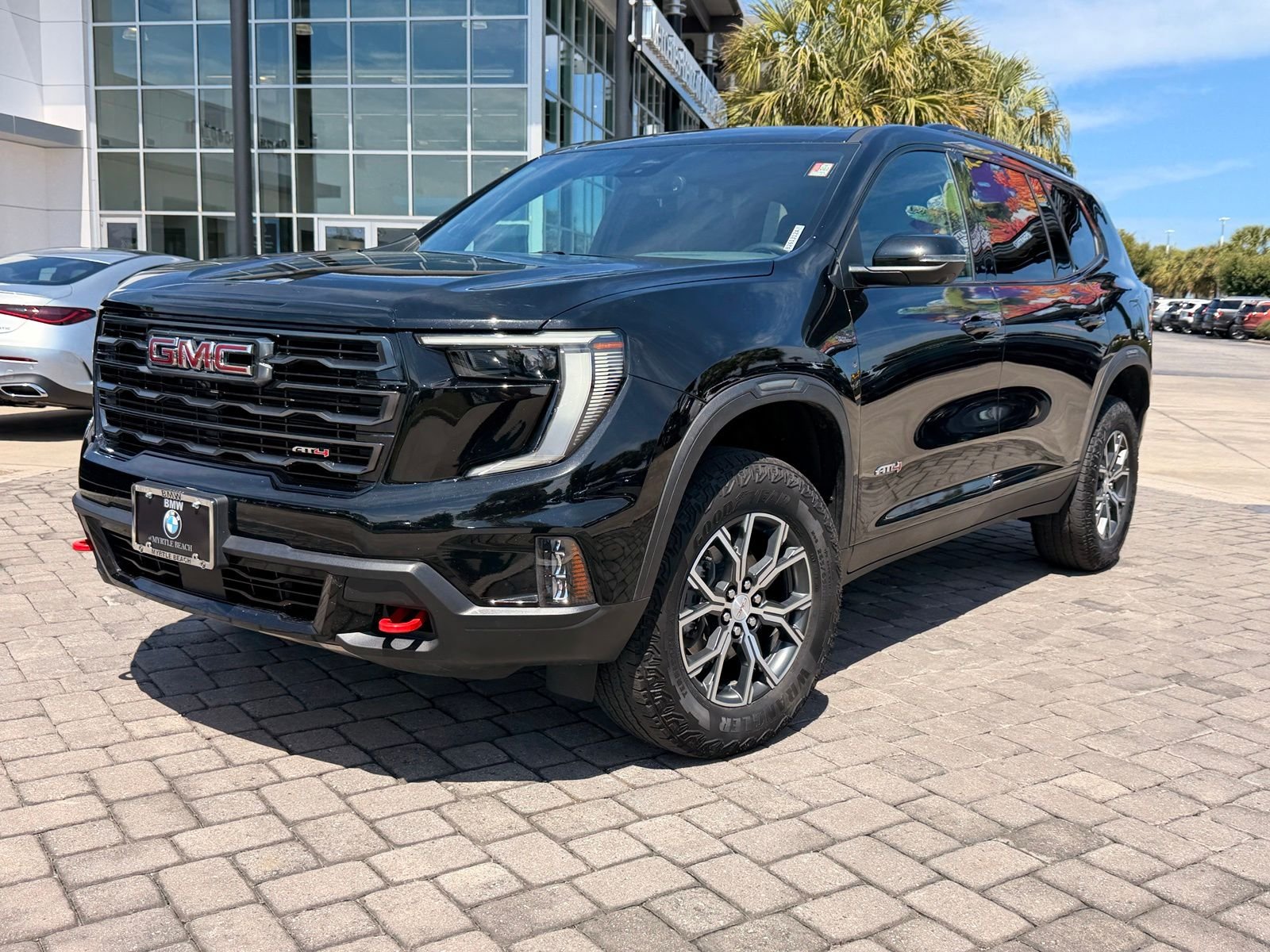 Used 2024 Ebony Twilight Metallic GMC AT4 image 1