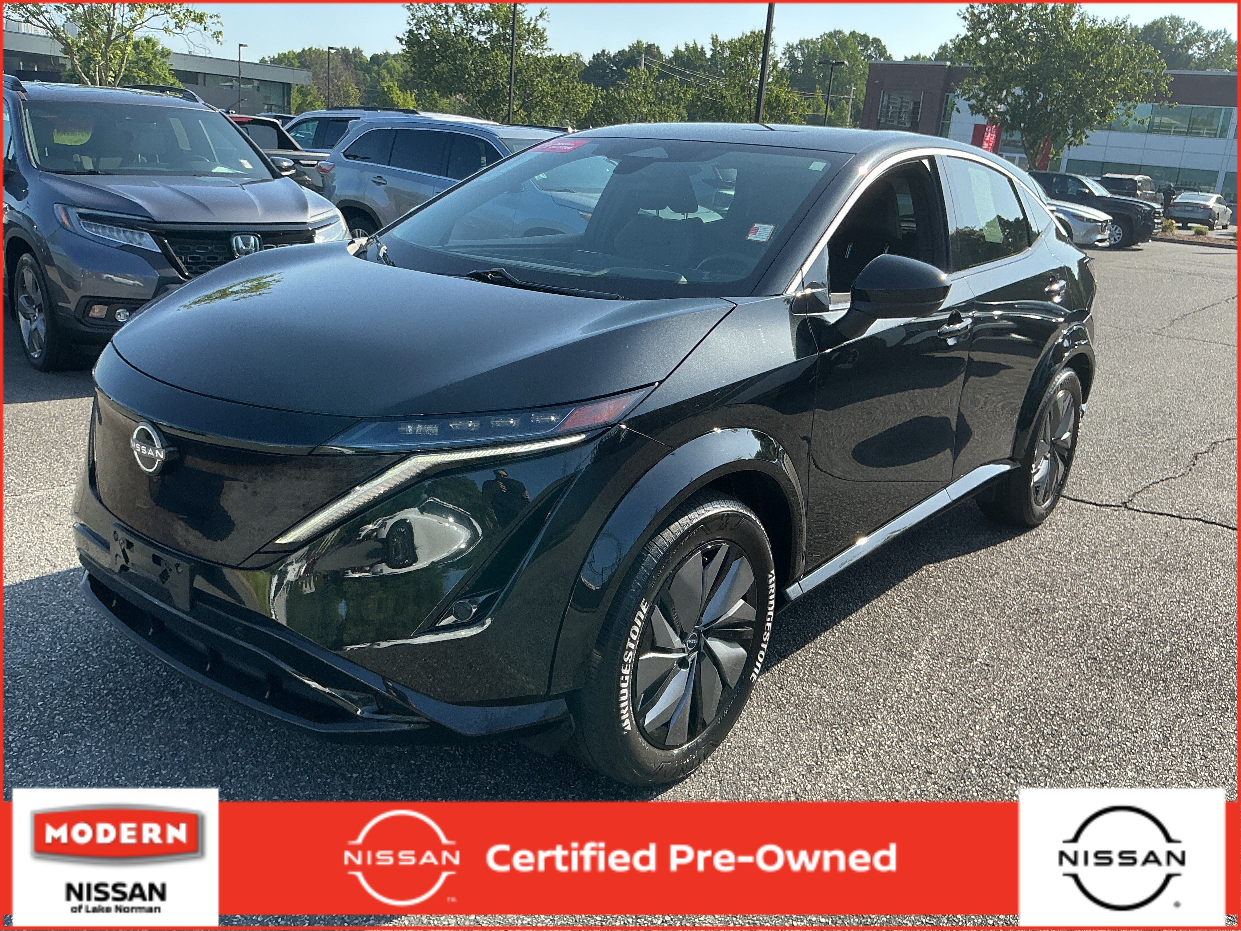 Used 2023 Black Diamond Pearl Nissan ENGAGE image 1
