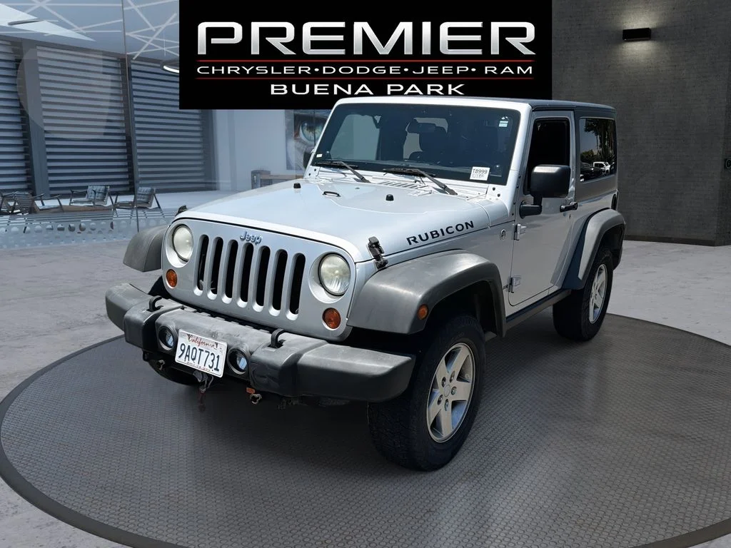 Used 2011 Silver Jeep Rubicon image 1