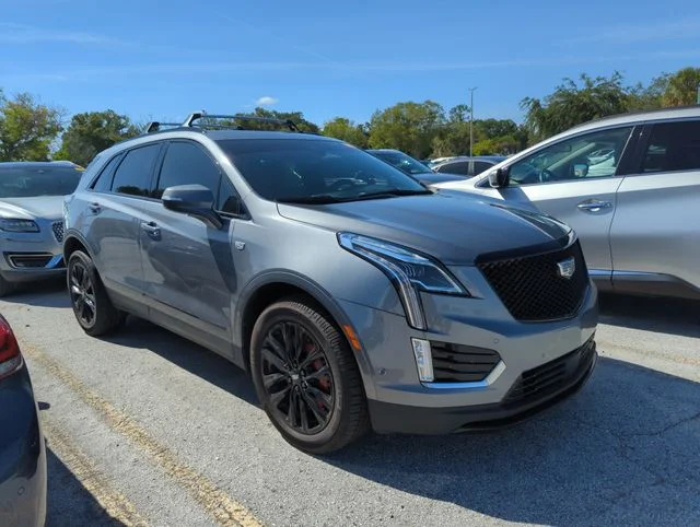Used 2022 Gray Cadillac Sport image 1