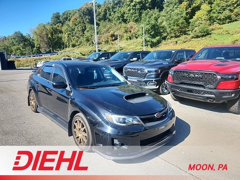 Used 2013 Black Subaru WRX image 1