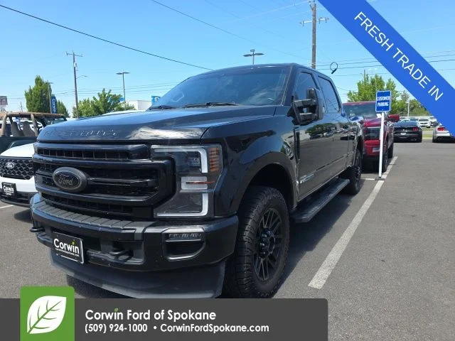 Used 2021 Agate Black Metallic Ford Lariat image 1