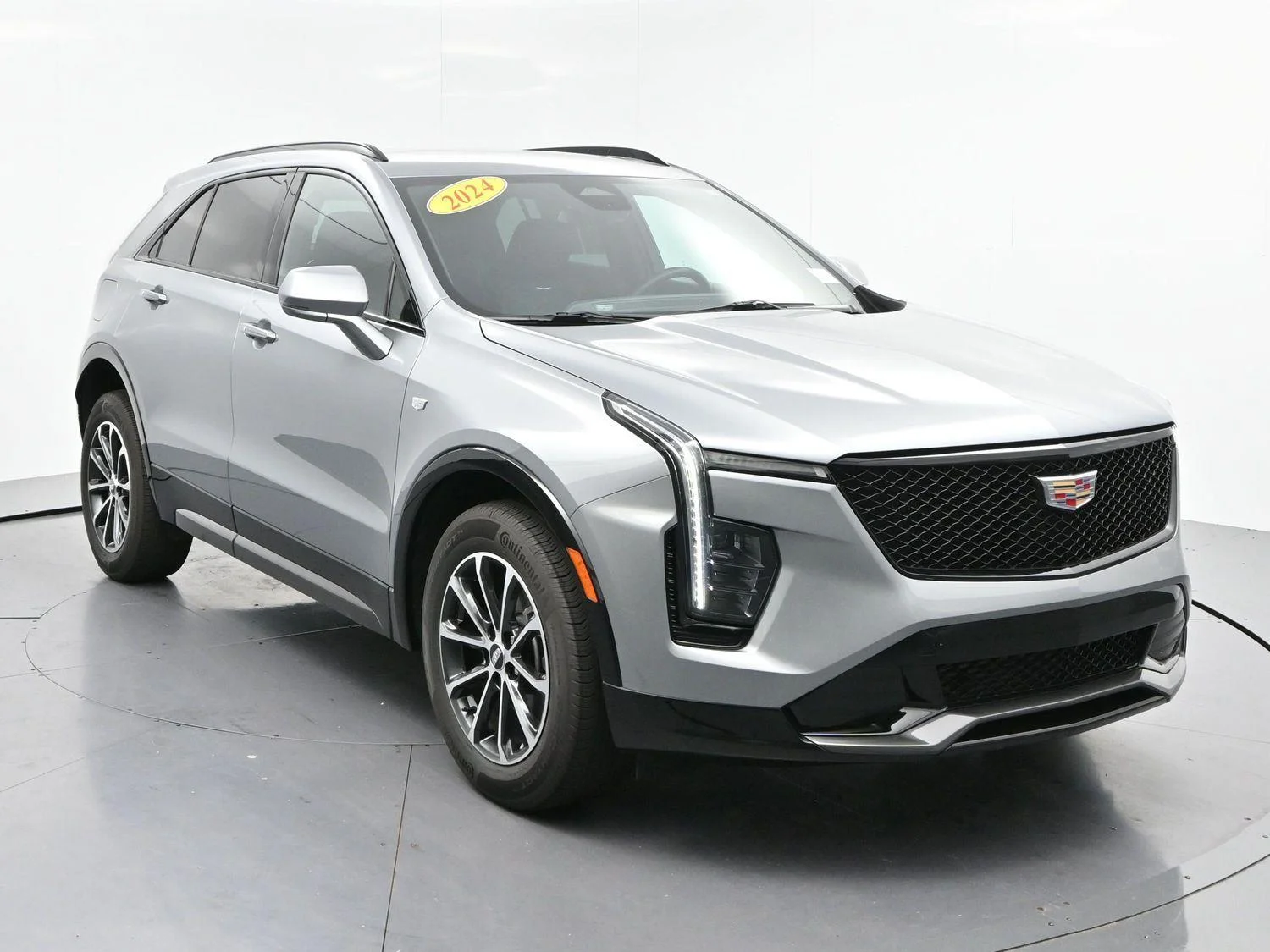 Used 2024 Argent Silver Metallic Cadillac Sport image 2