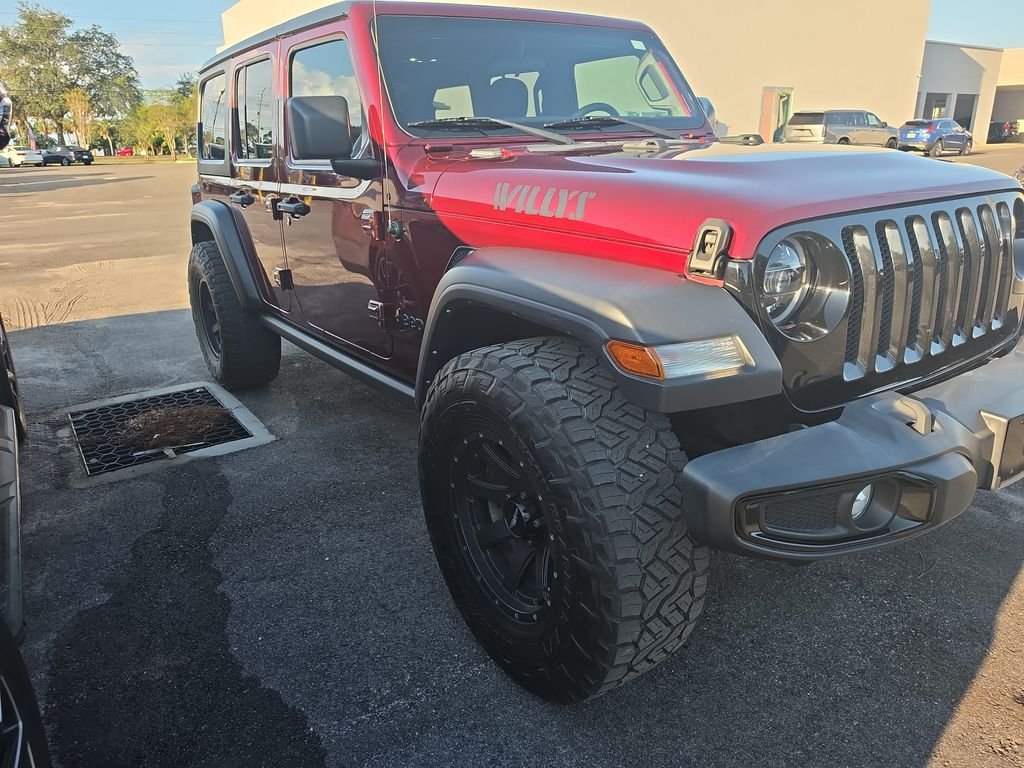 Used 2021 Red Jeep Unlimited Willys image 4