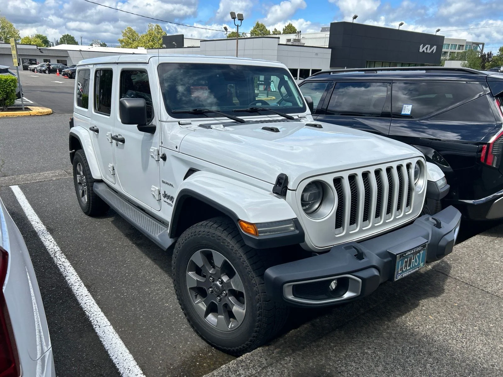 Used 2019 White Jeep Unlimited Sahara image 2