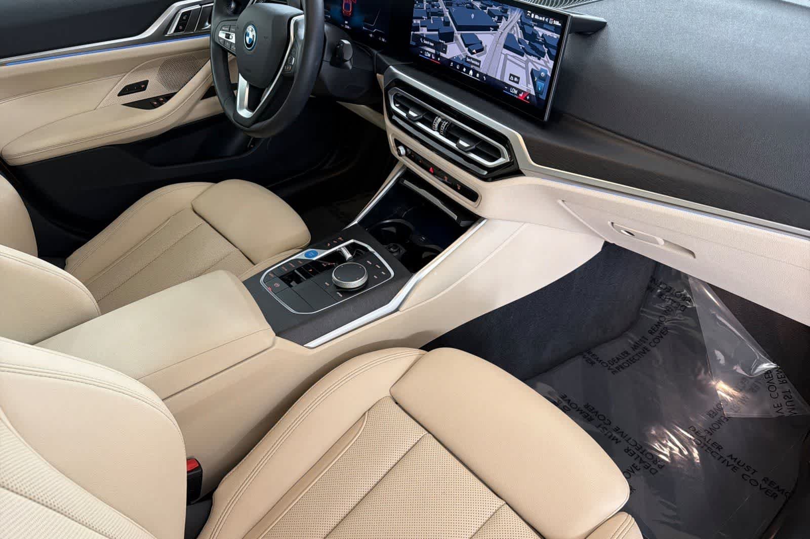 Used 2024 Sunset Orange Metallic BMW eDrive40 image 15