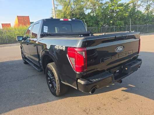 Used 2024 Agate Black Metallic Ford XLT image 4