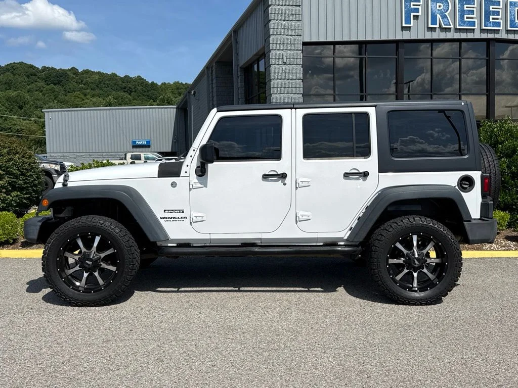 Used 2013 Bright White Jeep Unlimited Sport image 3