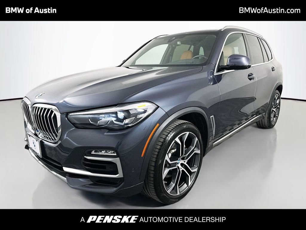 Used 2021 Arctic Grey Metallic BMW xDrive40i image 1