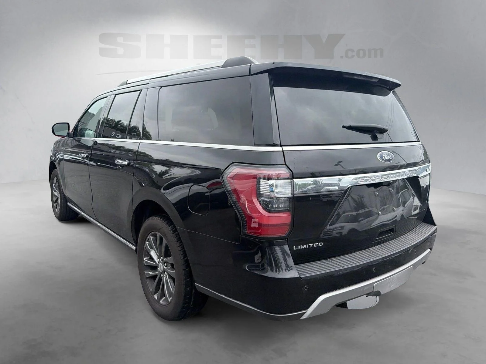 Used 2021 Agate Black Metallic Ford Limited image 14