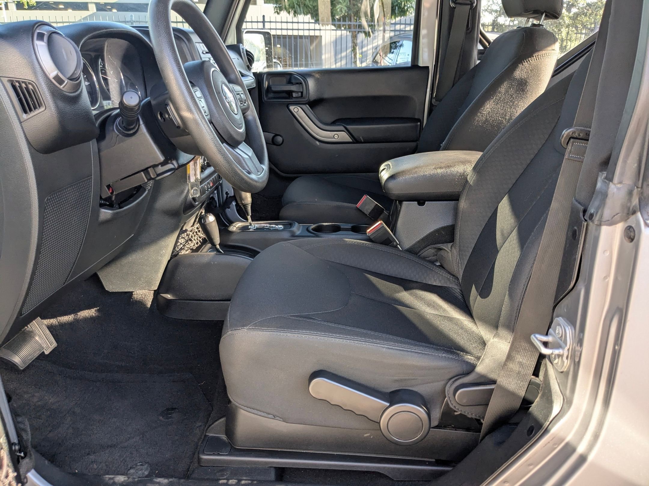 Used 2015 Billet Silver Metallic Clearcoat Jeep Sport image 9