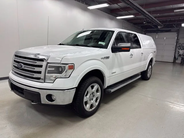 Used 2014 White Ford Lariat image 1