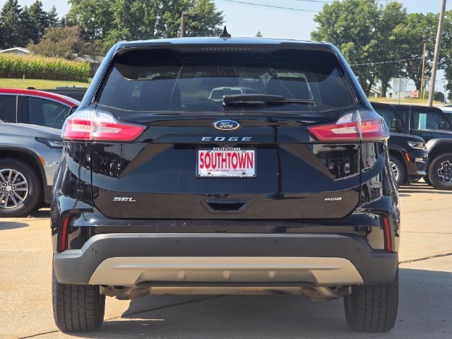 Used 2024 Agate Black Metallic Ford SEL image 6
