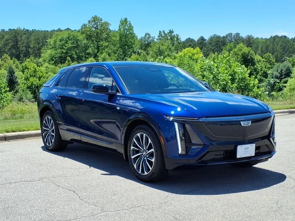 Used 2024 Opulent Blue Metallic Cadillac Sport 2 image 1