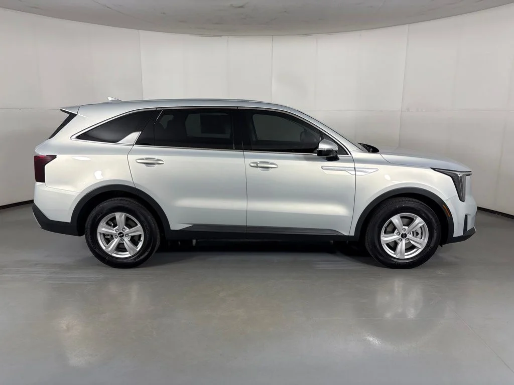 New 2026 Ivory Silver Kia LX image 9