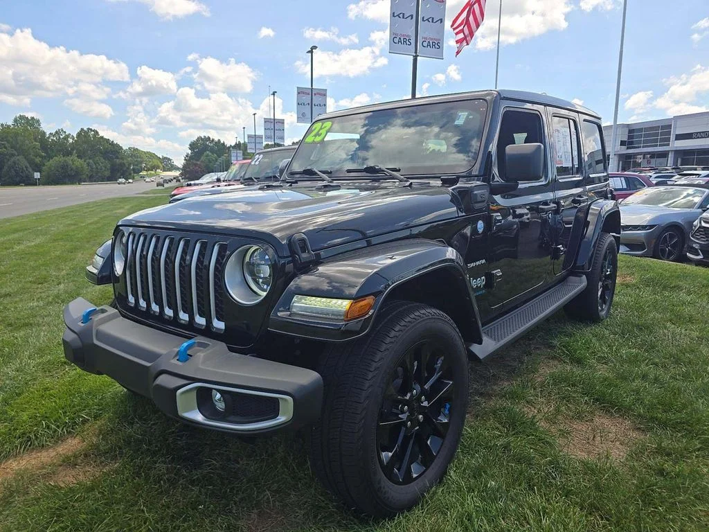 Used 2023 Black Jeep Sahara 4xe image 1