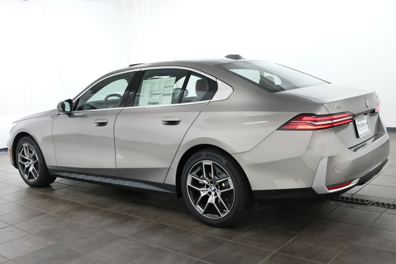 New 2027 Oxide Grey Metallic BMW 540i xDrive image 3