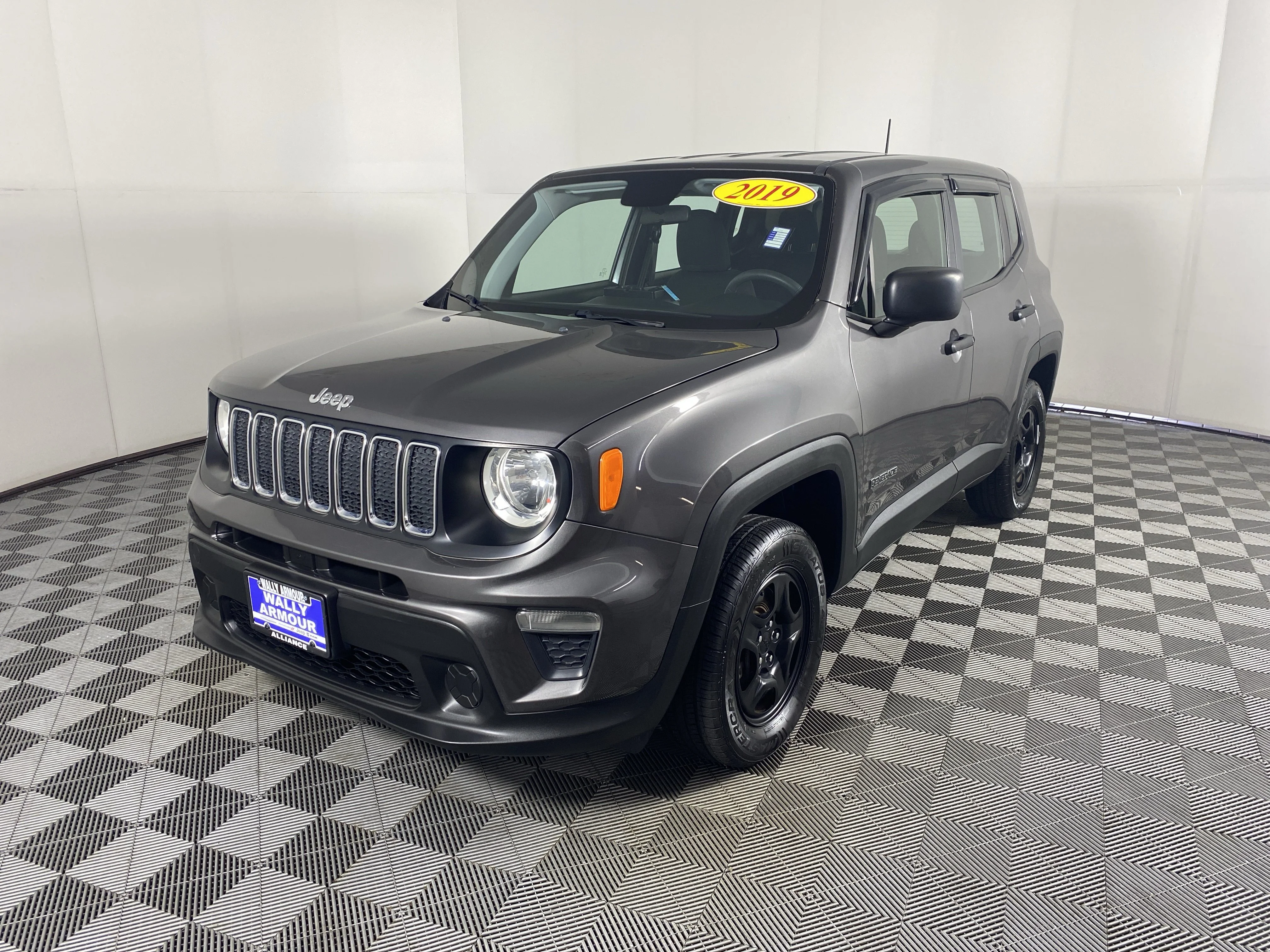 Used 2019 Granite Crystal Metallic Clearcoat Jeep Sport image 10