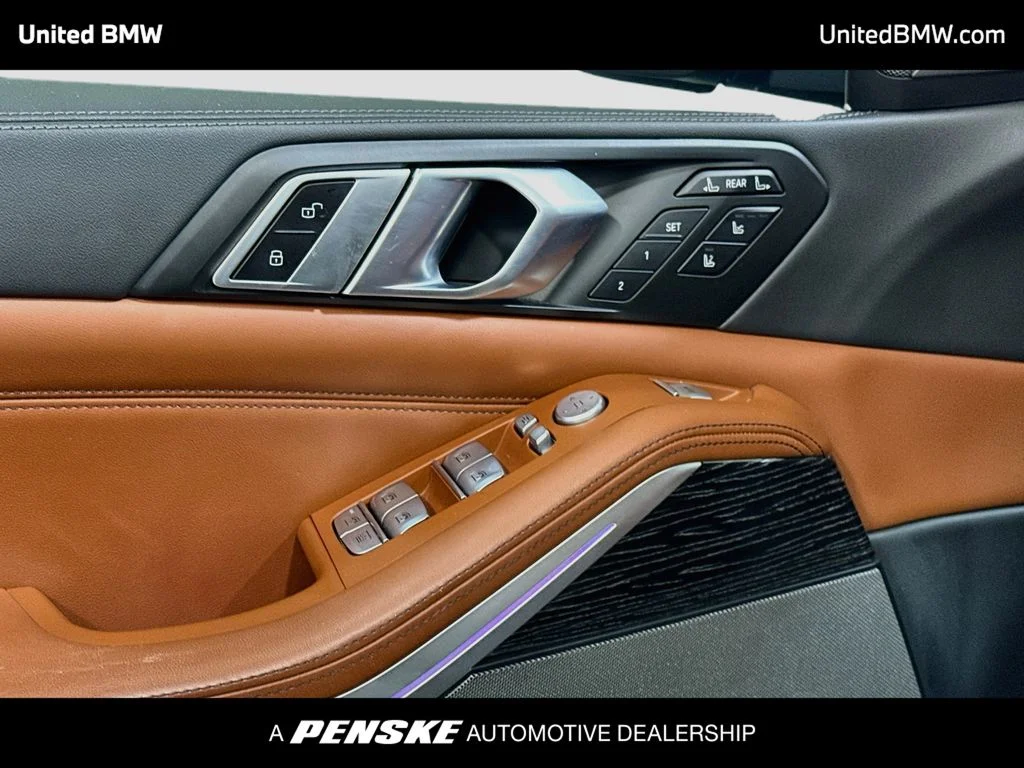 Used 2023 Black Sapphire Metallic BMW M60i image 3